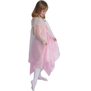 girl wearing pink fairy dress with white shimmery cape