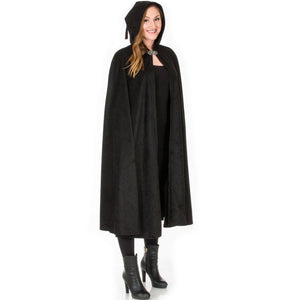 adult wearing black renaissance cape