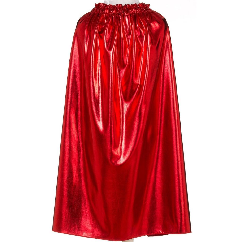 child wearing red superhero cape with crown and armbands