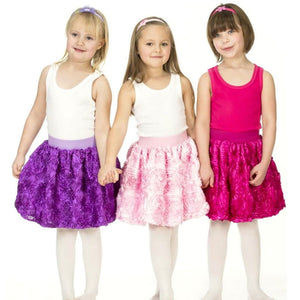 three girls dressed up in ribbon rose bubble skirts