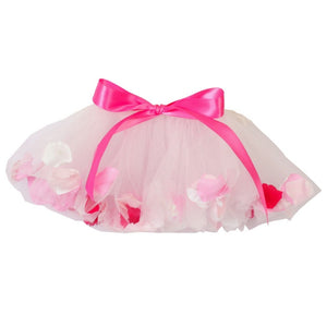 white tulle fairy tutu with flower petals and pink bow