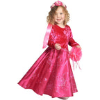 girl wearing fuchsia fairy princess dress and flower headband and holding wand