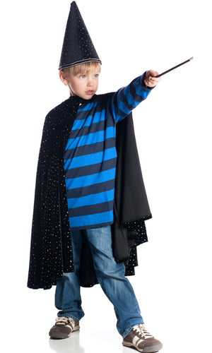 Boy dressed up as wizard pointing magic wand