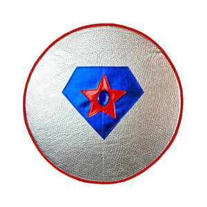 silver toy superhero shield with red star